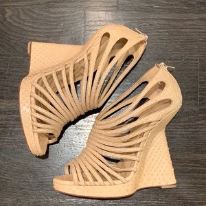 Christian Louboutin floating heel